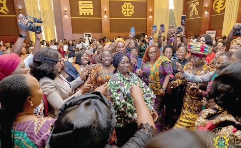 Prof. Naana Jane Opoku-Agyemang (middle), the Vice-President,  responding to cheers from some participants during the Annual National Forum on Women in Government and Media