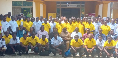Officials and participants who attended the training