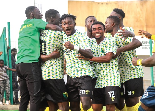 Players of Gold Stars celebrating their goal