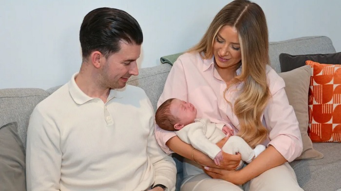 Grace Bell and Steven Powell with their baby son Hugo