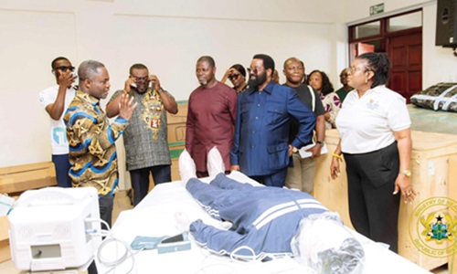 Kwabena Mintah Akandoh (left), Minister of Health, with Alfred Okoe Vanderpuije (2nd from right), MP for Ablekuma South, and other officials at one of the simulation centres at the University of Ghana Medical School