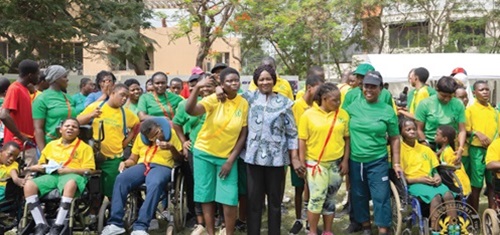 Professor Naana Jane Opoku-Agyemang (arrowed), Vice-President, with some students of the New Horizon Special School in Accra INSET: The items presented