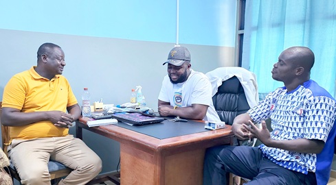 The front view of the Likpe Polyclinic. INSET: Dr (Med) Kingsley Tettey (middle), Medical Superintendent and Bismark Quaye, Administrator of the facility, speaking to the reporter. Pictures: DOUGLAS ANANE-FRIMPONG