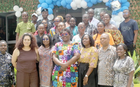 Owusuaa Kyeremeh (middle), DOVVSU Director, and Ishmael Selassie Gbedzeha (2nd from right), UNFPA Ghana Programme Analyst, with other officials and dignitaries after the inauguration of the DOVVSU Therapeutic Garden. Picture: ESTHER ADJORKOR ADJEI.