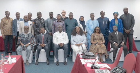 Dr Cassiel Ato Forson (seated 3rd from left), Minister of Finance­; Matilda Asante (2nd from right), Second Deputy Governor, Bank of Ghana; Kwadwo Twum Boafo (left), CEO, FIC; Elizabeth Yankah (3rd from right), Deputy National Security Coordinator, and representatives of GIABA­
