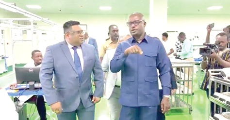 John Abdulai Jinapor (right), Minister of Energy and Green Transition, inspecting the facility. With him is Niket Goel, Director of the Ghana Office of MBH Power Limited