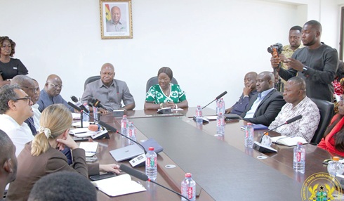 Elizabeth Ofosu-Adjare (middle), Minister of Trade, Agribusiness and Industry; Joseph Bukari Nikpe (left), Minister of Transport, with representatives of the Cement Manufacturers Association, officials of Ghana Ports and Harbours Authority, Ghana Association of Port Users and staff from Trade and Transport Ministries at the meeting