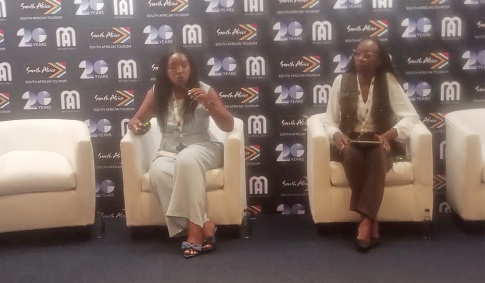 Diana Njuguna (left), Chief Operating, Africa Smart Cities Investment Summit, explaining a point at the launch of the event