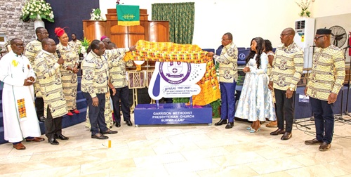 Ernest Brogya Genfi (4th from right), Deputy Minister for Defence, unveiling the 70th anniversary logo