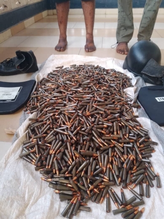 Immigration officer picked up in connection with 2,600 rounds of AK 47 ammunition that was being transported to the north