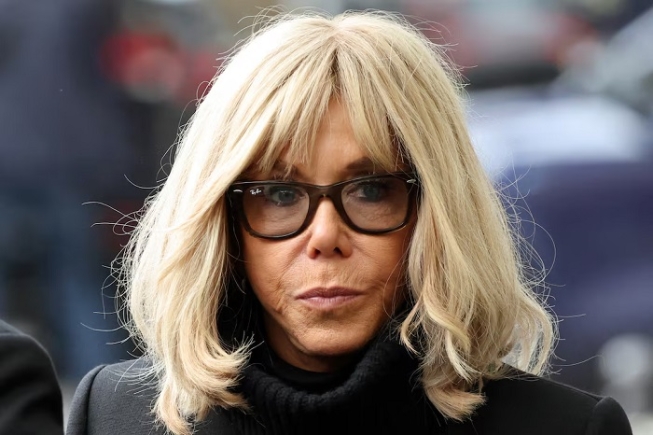 French president's wife Brigitte Macron arrives ahead of the ceremony outside "La Belle Equipe" bar in Paris on November 13, 2025 LUDOVIC MARIN/Pool via REUTERS