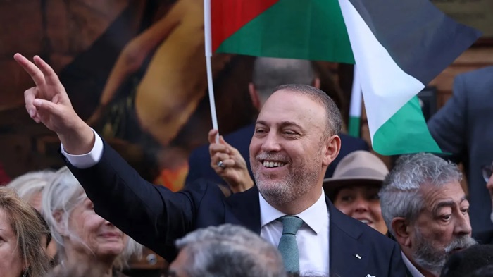 Husam Zomlot, head of the Palestinian mission to the United Kingdom, gestures during a ceremony after Britain announced on Sunday its recognition of a Palestinian state at the mission's headquarters in London, Britain, September 22, 2025. (photo credit: ILLUSTRATIVE, REUTERS/TOBY MELVILLE)