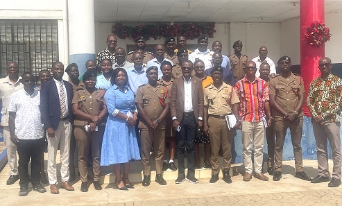Francis Lamptey, (5th from right), Regional Chief Manager, Accra West Region, and DO II Marsell Kwami Avadu (5th from left), with officers from GWL Accra West Region and the GNFS after the meeting