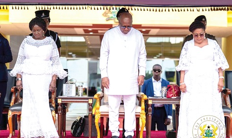 President John Mahama flanked by Prof. Naana Jane Opoku-Agyemang (left), Vice-President, and Lordina Mahama, First Lady, in a prayer mood during the service yesterday