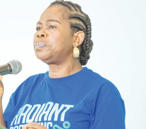 Gifty Agyemang (inset), founder of Radiant Parenting, speaking to participants in the conference