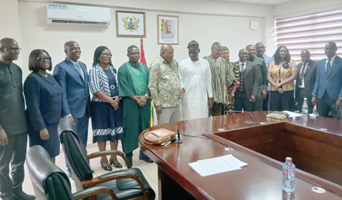 Haruna Iddrisu (arrowed), Minister of Education; Dr Clement Apaak (8th from left), Deputy Minister of Education, and Samuel Gariba (6th from left), Board Chairman, and other members of the board and directors of the Ministry after the inauguration