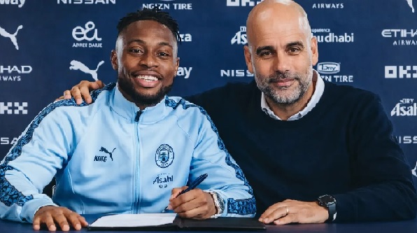 Antoine Semenyo with Pep Guardiola, Man City Manager