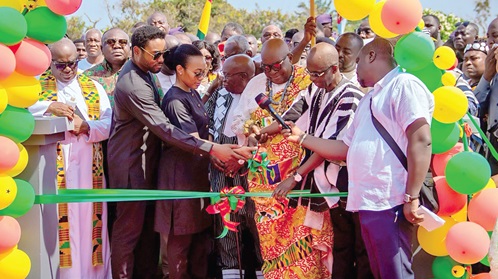 Johnson Asiedu Nketiah (2nd from right), assisted by Togbe Sri III (middle), Awoamefia of Anlo, Dr Zanetor Agyeman-Rawlings and Kimathi  Rawlings to cut the tape to commission the statue