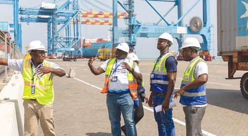 Mustapha Adamah (2nd from left), Head of Maritime Security, Search and Rescue at GMA, interacting with Hazardous Supervisors at MPS Terminal at Tema Port