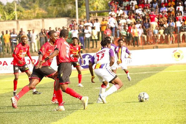 Hearts of Oak’s Hamza Issah advancing with the ball during thier game against Hohoe United