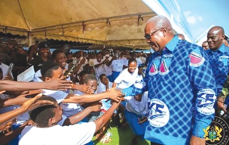 President Mahama exchanging greetings with some students at the 65th anniversary of  GHANASCO