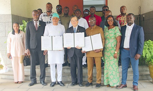 Hiroshi Yoshimoto ( 4th from right), Japanese Ambassador to Ghana, with Abdul Rashid Musah (3rd from left), Nanumba South DCE; Charles Appiah-Kubi (3rd from right), Bosome Freho DCE, and other officials of the respective district assemblies. Picture: ERNEST KODZI 