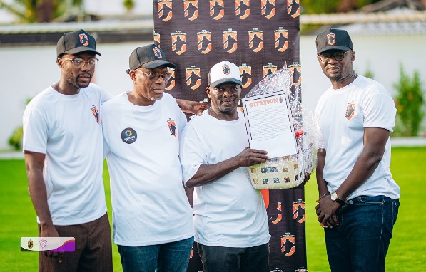 Nana Yaw Konadu (right) honoured by the PKO Foundation