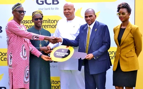 Mohammed Yakubu Mustapha (left), Headmaster for TAMASCO receiving key to the facility from Farihan Alhassan (2nd from right), MD of GCB. Looking on are  Alhassan Alidu Jnr (2nd from left), Northern Regional Director for Ghana Education Service, and  Professor Joshua Alabi (middle),  Board Chairman of GCB. INSET: The refurbished dormitory block at the Tamale Senior High School