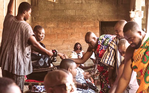 Okweredom Owusu Obuobi (right), new Mponuahene of Awukugua shaking hands with the Chief of the area, Osabarima Opese Konadu II to seek his blessingsOkweredom Owusu Obuobi (right), new Mponuahene of Awukugua shaking hands with the Chief of the area, Osabarima Opese Konadu II to seek his blessings