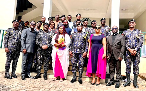 Christian Tetteh Yohuno (4th from right), the IGP, with Grace Ashly and other senior officers of the Ghana Police Service