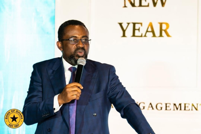 Dr Johnson Pandit Asiama (right), Governor, Bank of Ghana, interacting with Albert Kwabena Dwumfour (left), President, GJA, at the inaugural Governor's New Year Media Engagement