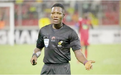 Referee Daniel Laryea