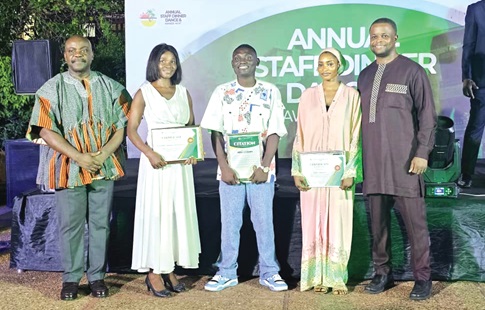 Ralph Ayitey (left), CEO of Coconut Grove Regency Hotel, Desmond Adu Gyamfi (3rd from left), the Overall Best Employee, Dr Nana Kweku Ndoum (right), the President of Groupe Ndoum Ghana, and other award winners