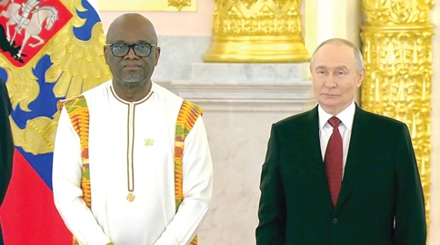 Dr Koma Jehu-Appiah, Ghana’s Ambassador to Russia, with Vladimir Putin, President of Russia, after the ceremony