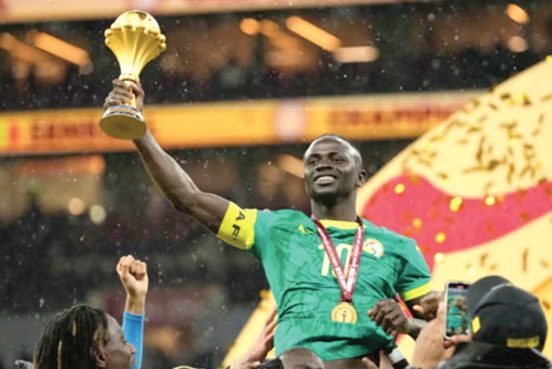 Sadio Mané with the 2025 AFCON trophy