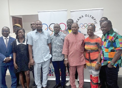 • Richard Akpokavie (arrowed), Dauda Fuseini (5th from left) and some GBF executives during their visit to the Ghana Olympic Committee