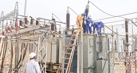 Engineers from GRIDCo working to fix the broken down Transformer Two which has caused a major power outage in Sunyani