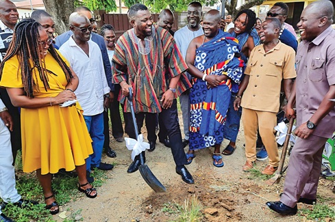 John Dumelo (3rd from left), MP, Ayawaso West Wuogon Constituency, and Dr Michael Mensah (right), MCE, Ayawaso West, expressing excitement after the sod cutting ceremony. With them are officials of the assembly and teachers of the school