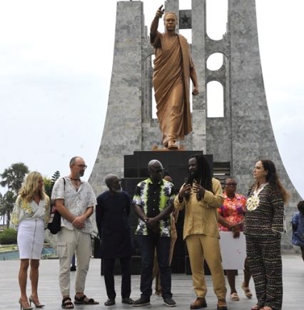 Rocky Dawuni (2nd from right), renowned Ghanaian musician, expaining a piont to some guests at an event at the Kwame Nkrumah Memorial Park