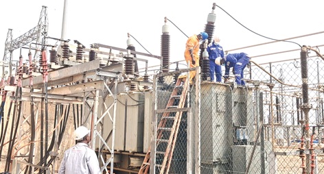 Engineers from GRIDCo busily working to repair the transformer
