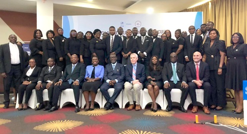 Justice Paul Baffoe-Bonnie (middle), Chief Justice; Justice Issifu Omoro Tanko (3rd from left), Director of the Judicial Training Institute, and Anita  Budu (4th from left), Country Director of IJM, with stakeholders and judges at the launch of the online curriculum