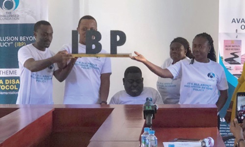 Selassie Sikanku (left), Ella Ametor (2nd from left) and other representatives of the Challenged Foundation launching the IBP