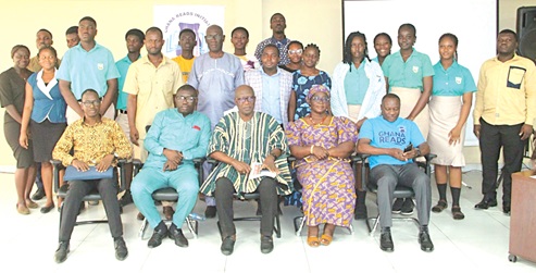 Tina Aforo-Yeboah (seated 2nd from right), Chairperson, Ghana Reads Initiative, with Gapson Kofi Raphael (seated 2nd from left), General Secretary, National Council, Parent Teacher Associations; Kwasi Nimo Jnr, Programmes Office, Africa Education Watch, some dignitaries and other participants. Picture: ERNEST KODZI 