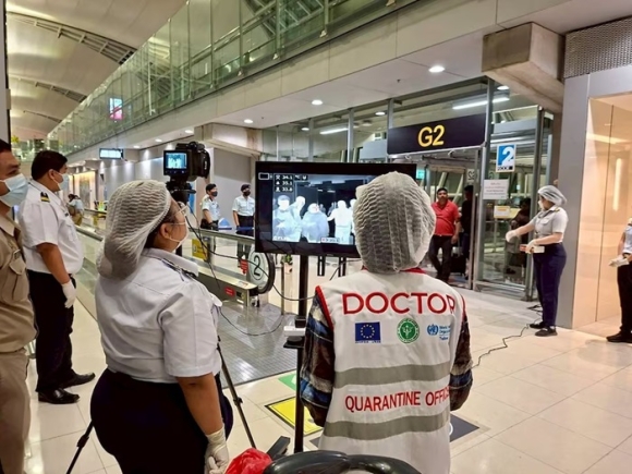 Airport health authorities wearing protective masks monitor passengers from international flights arriving at Suvarnabhumi International Airport in Bangkok, Thailand, January 25, 2026, following the implementation of health screening measures for passengers arriving from West Bengal, India, amid reports of a Nipah virus outbreak. Suvarnabhumi Airport Office /Handout via REUTERS