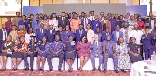 Dr Agnes Naa Momo Lartey (seated 5th from right), Minister of Gender, Children and Social Protection, with other speakers and participants in the conference