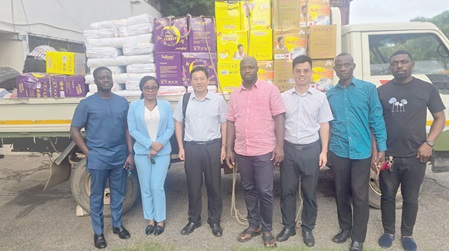 Representatives of Softcare FM Manufacturing Ltd with the items at the Office of the Chief of Staff