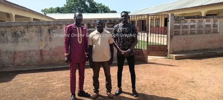 Samuel Donkor (middle) with the two newly posted teachers, Simon Uwumborlayi (left) and Jagri Thomas Ntesan (right), pose in front of the school