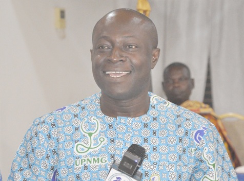 Maxwell Oduro Yeboah (right), National President of the Union of Professional Nurses and Midwives, addressing the conference