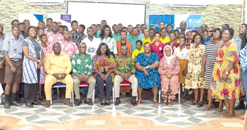 The participants with judges and resource persons after the competition