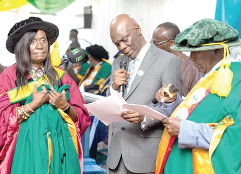 Prof. Eric Kwasi Ofori (middle), Vice-Chancellor of Garden City University, taking the oath of office